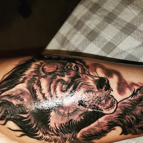 Work by Our Lady Of Ink Tattoo