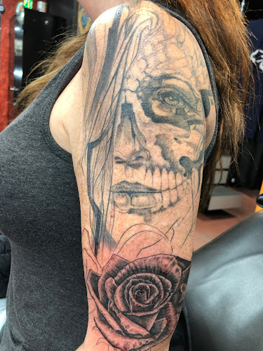 Work by Physical Graffiti Tattoo
