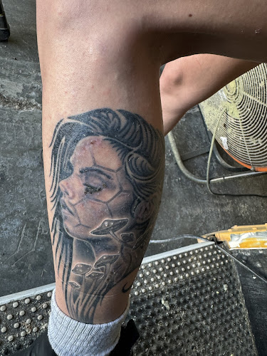 Work by State of Mind Tattoo shop