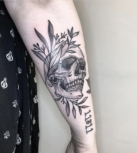 Work by The Mountain Mule Tattoo Company