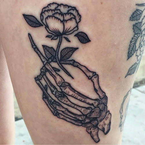 Work by Dapper Tattoo LLC