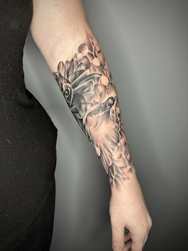 Work by Birds Eye View Tattoo