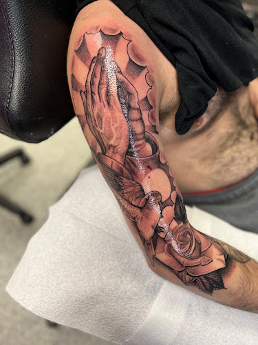 Work by Sanctioned Arts Tattoo Co.