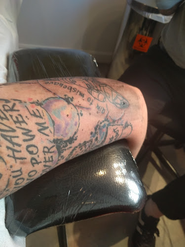 Work by Chameleon Tattoo