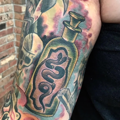 Work by Snake Oil Tattoo
