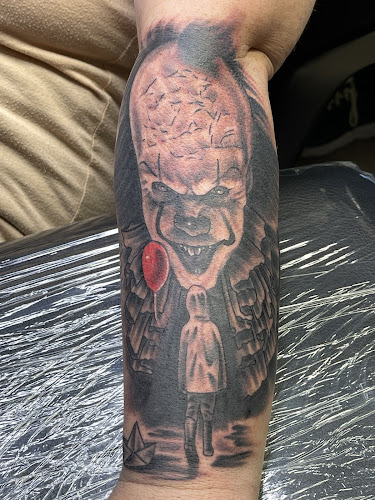 Work by Old School Ink Electric Tattooing