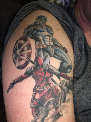 Work by All American Tattoo