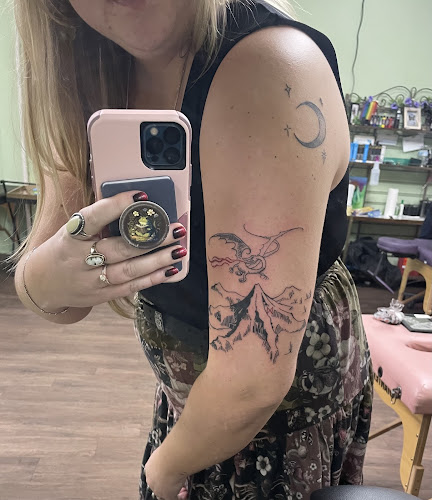 Work by Golden Dragoness Tattoo and Art Collective