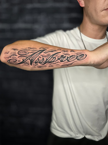Work by New World Tattoo