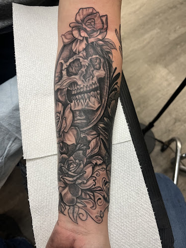 Work by Platinum Rose Tattoo Studio