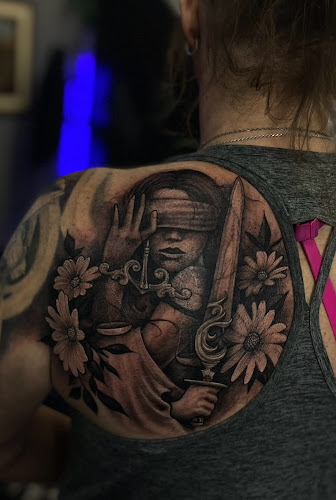 Work by BRASS HOOK TATTOO