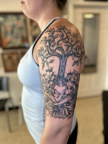 Work by Frenchtown Tattoo Company
