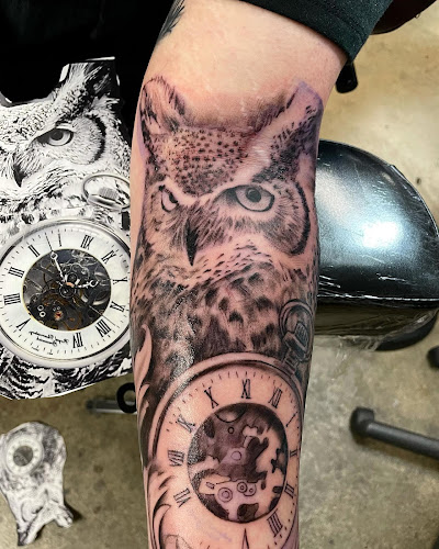 Work by Crimson Dove Tattoo & Piercing