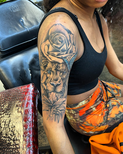 Work by Golden Toad Tattoo