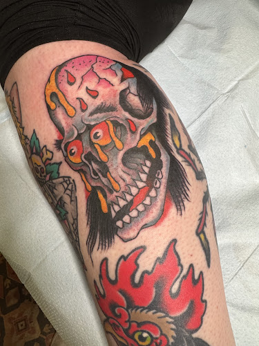 Work by Trader Bob's Tattoo Shop