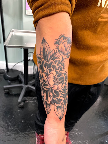Work by Grand Avenue Tattoo