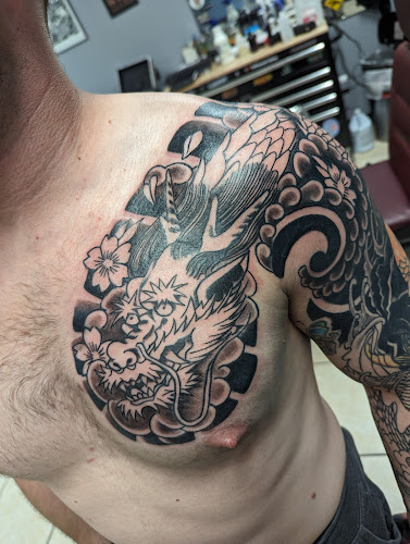 Work by Sailor Beware Tattoo