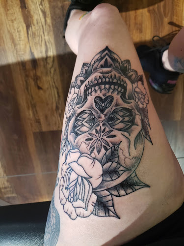 Work by Big Bear Tattoo