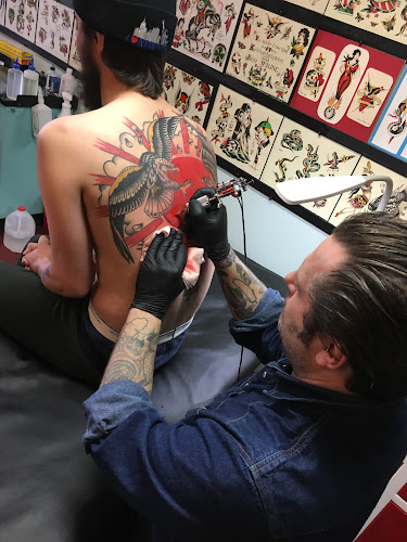 Work by King Cobra Tattoo