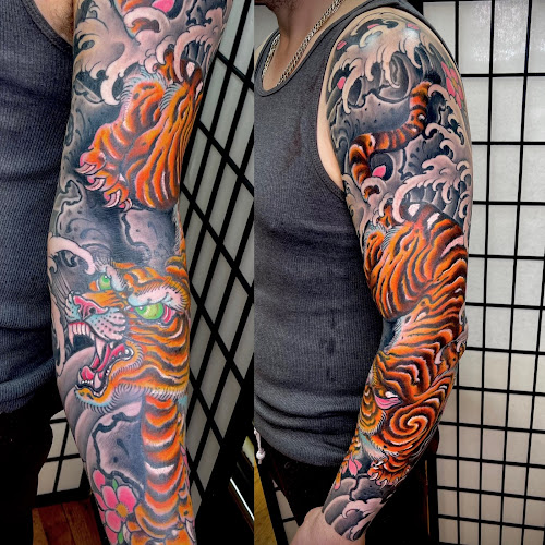 Work by Bound For Glory Tattoo