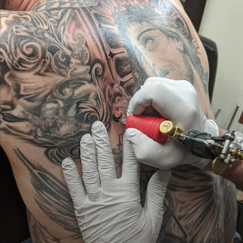 Work by Rayzor Tattoos
