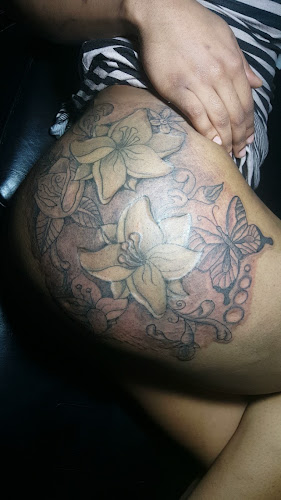 Work by InkByDeuce Tattoos & Piercings