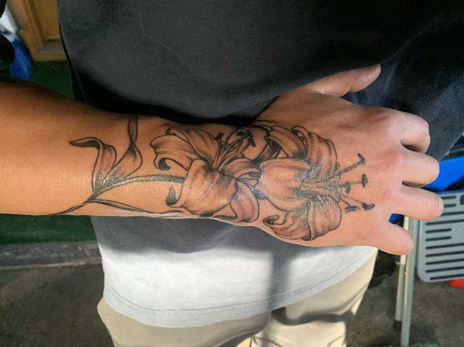 Work by Dragon's Glen Tattoos