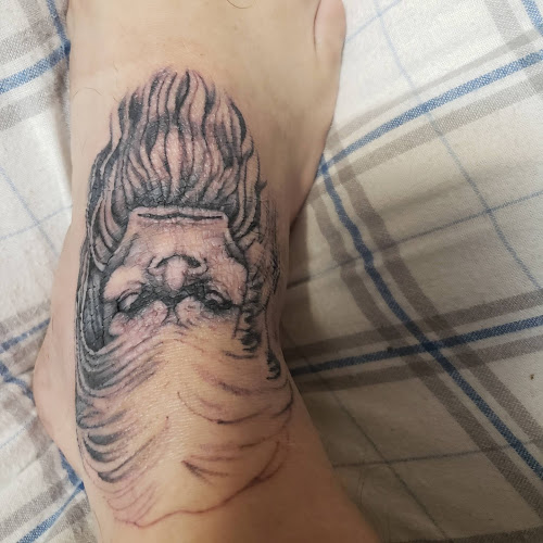 Work by Blue Lotus Tattoo & The Piercing Lounge