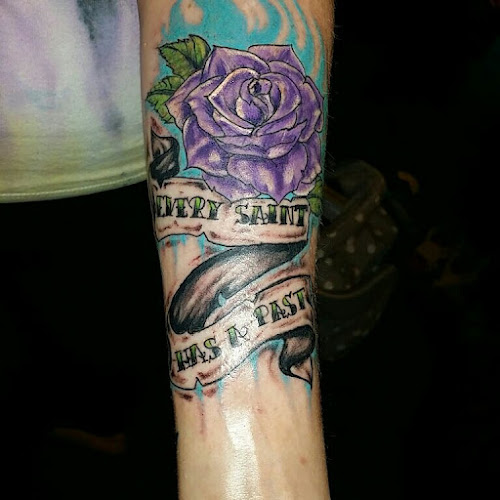 Work by Axonic Inkworks Custom Tattoo Studio