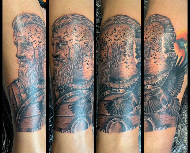 Work by Knuckles & Needles Tattoo Parlor