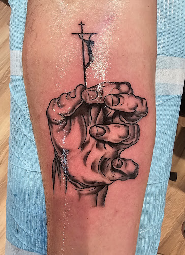 Work by Tommy Houlihan's Miraculous Medal Tattoo