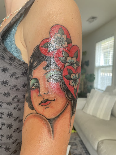 Work by GOLDEN COBRA TATTOO CLUB