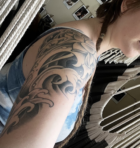 Work by Iron Wolves Tattoo