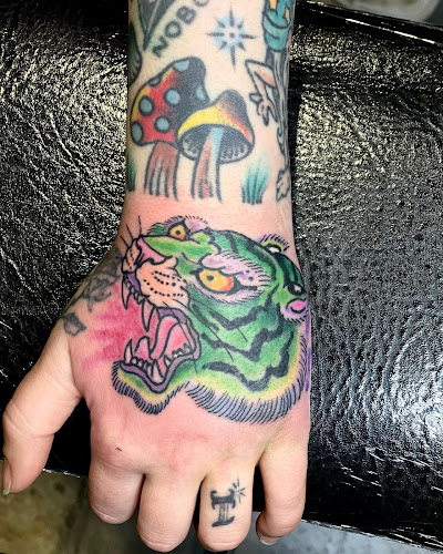 Work by Black Leopard Tattoo