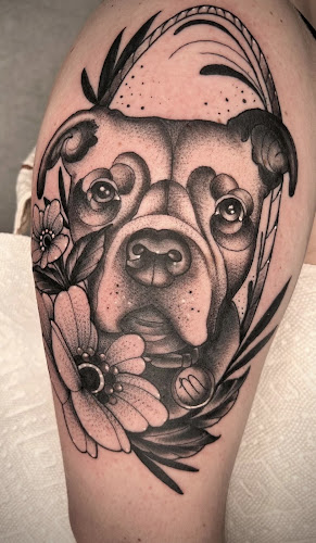 Work by Goldfinch Tattoo Company