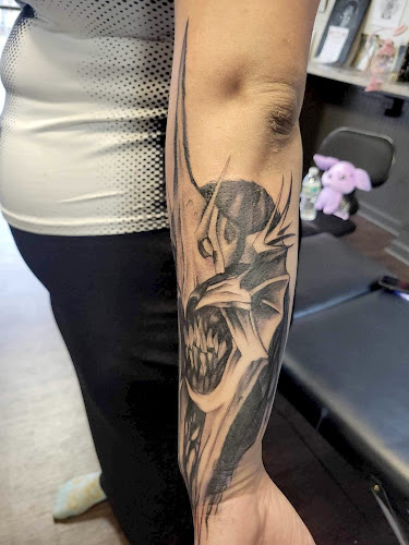 Work by Skull City Tattoos