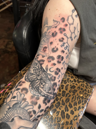 Work by Brass Monkey Tattoo Company