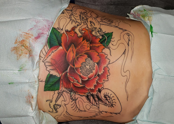 Work by Flaming Dragon Tattoo
