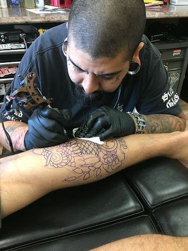Work by Rolling Gypsy Tattoo