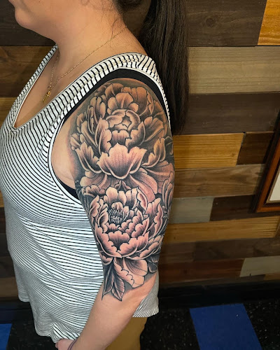 Work by Alpha Tattoo co.