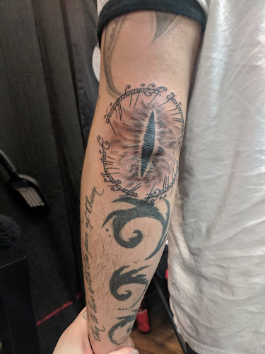 Work by Brass Monkey Tattoo Co
