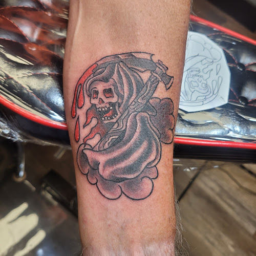 Work by White Lotus Tattoos on 9LLC