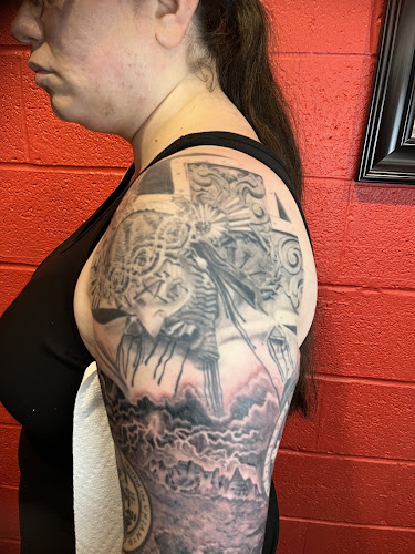 Work by Fine Line Tattoo