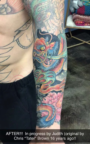 Work by Looking Glass Tattoo & Gallery
