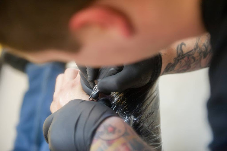 Work by Olympus Ink Tattoo