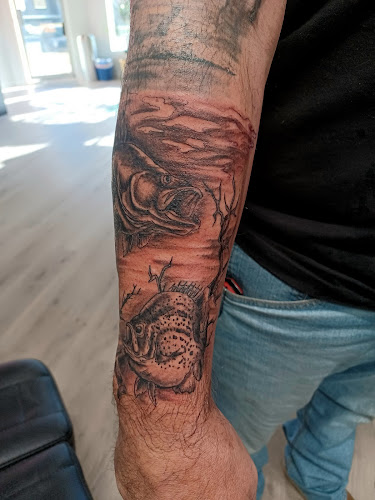 Work by Pigment Tattoo Lounge & Gallery