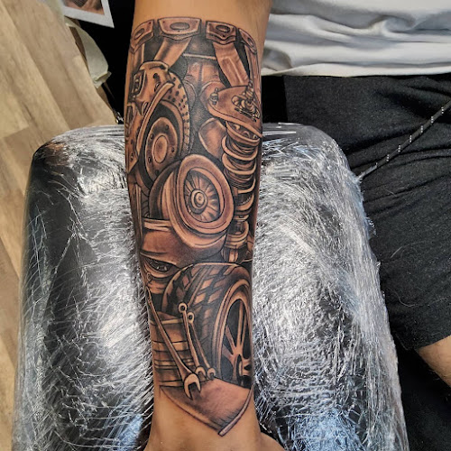 Work by Papaz Tattoo Studio at 1903 Saloon