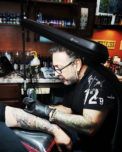 Work by Forbidden Images Tattoo Studio