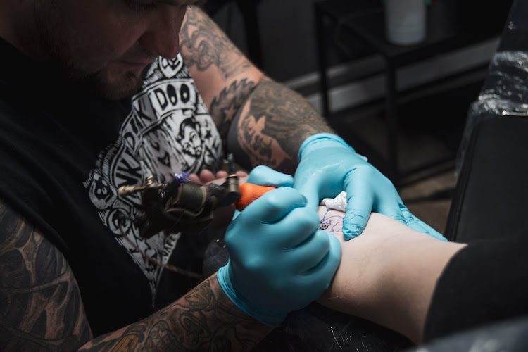 Work by National Pike Tattoo