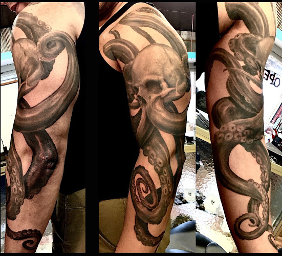Work by Mark of Cain Tattoos